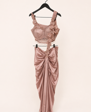 Peach Satin Pre-Stiched  Saree with Net Top and Dangling Beads . Simple floral Design