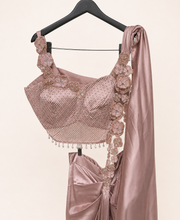 Peach Satin Pre-Stiched  Saree with Net Top and Dangling Beads . Simple floral Design