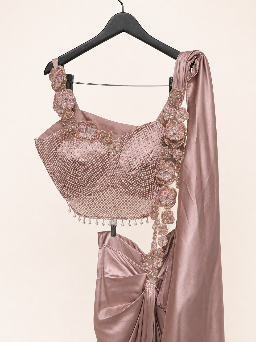 Peach Satin Pre-Stiched  Saree with Net Top and Dangling Beads . Simple floral Design