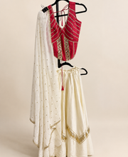 Red and White Cross Cut Choli Design with Sleeveless Top