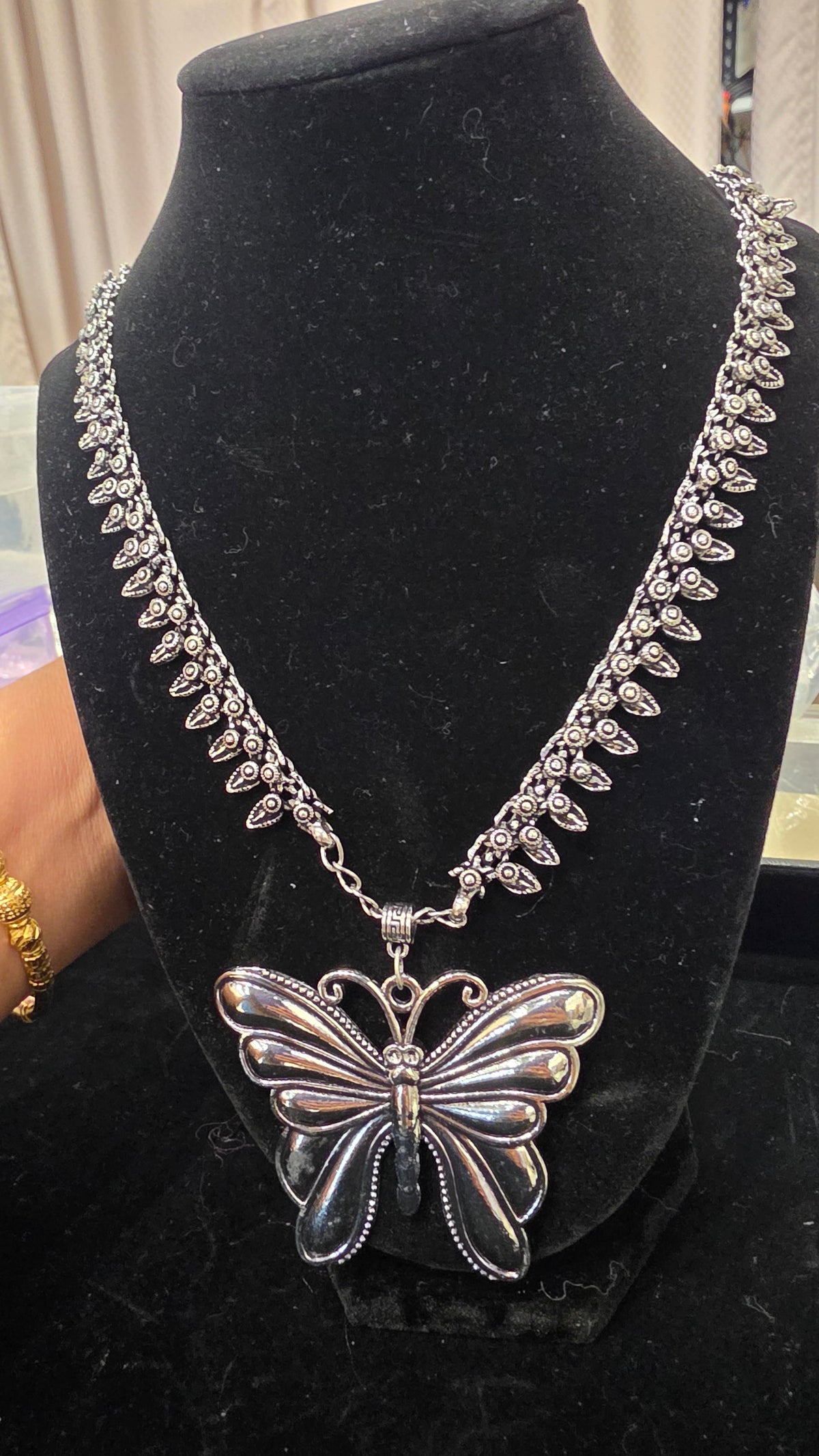 Long oxodised butterfly necklace