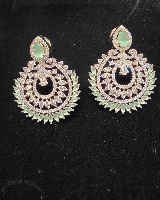 silver-toned chandelier mint green earrings