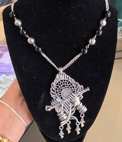 Peacock feather necklace in oxodised
