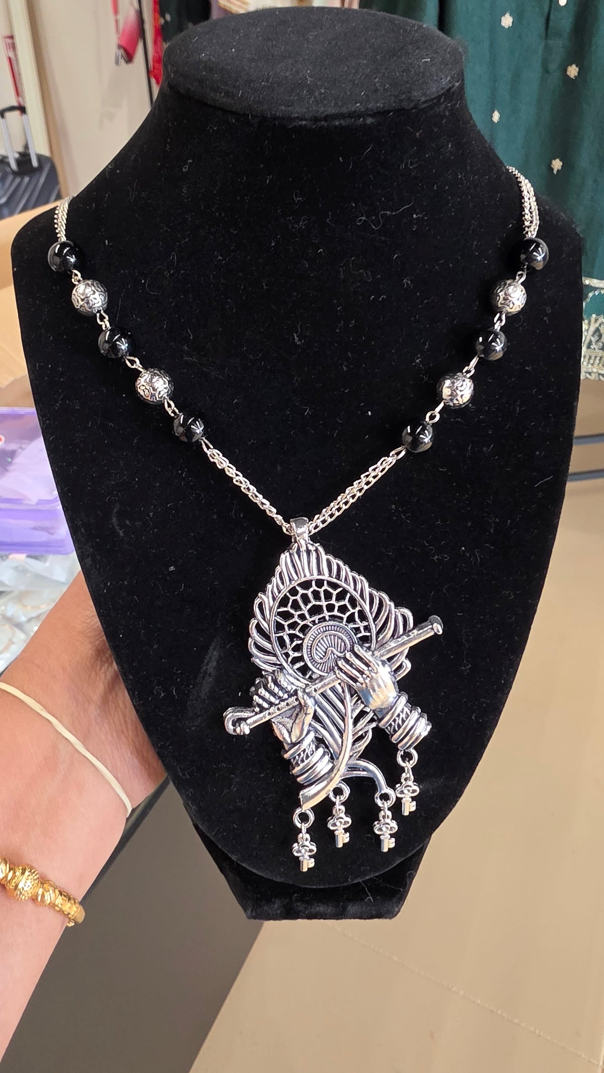 Peacock feather necklace in oxodised