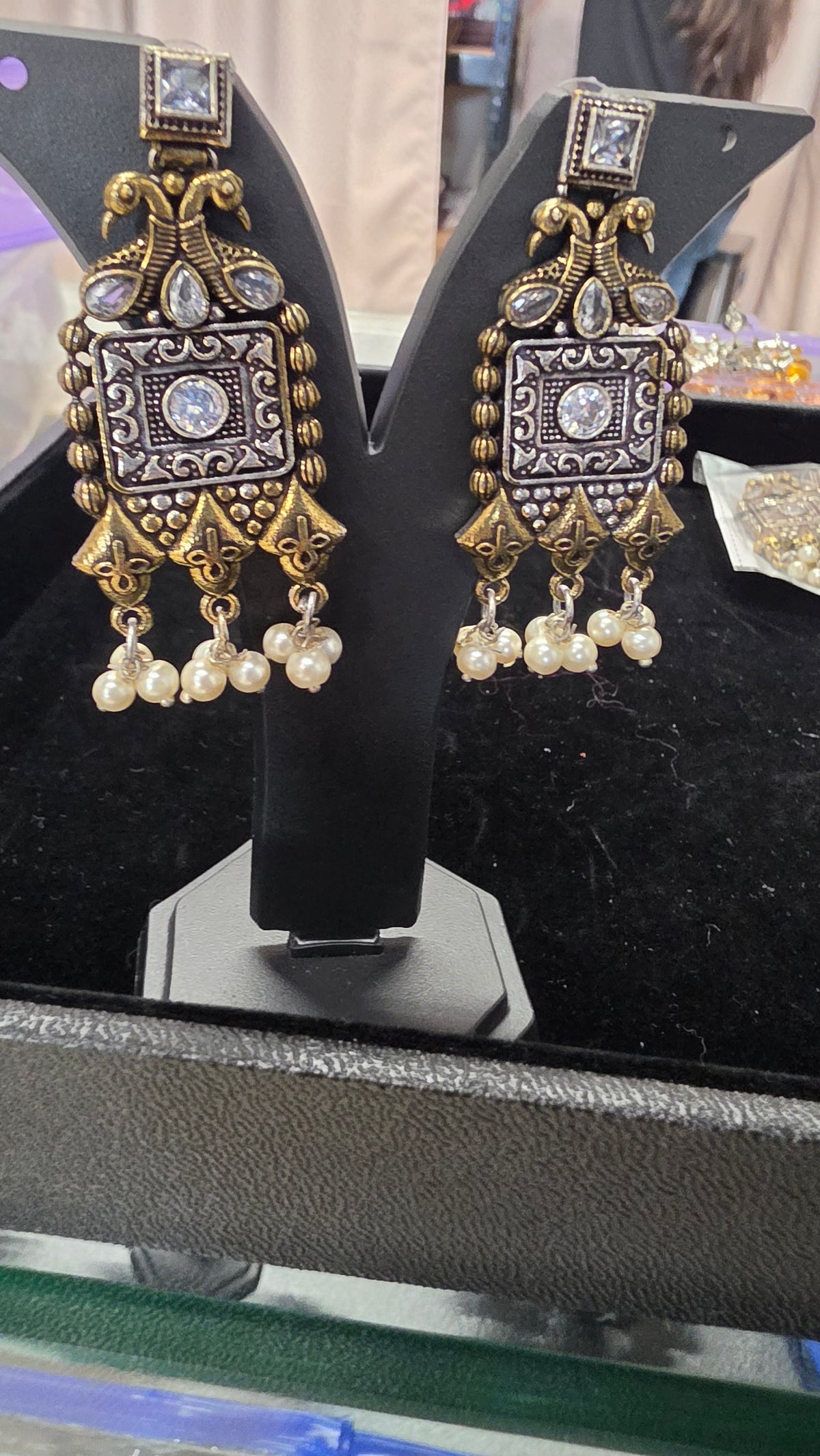 Oxodised peacock style Earring with gold touch
