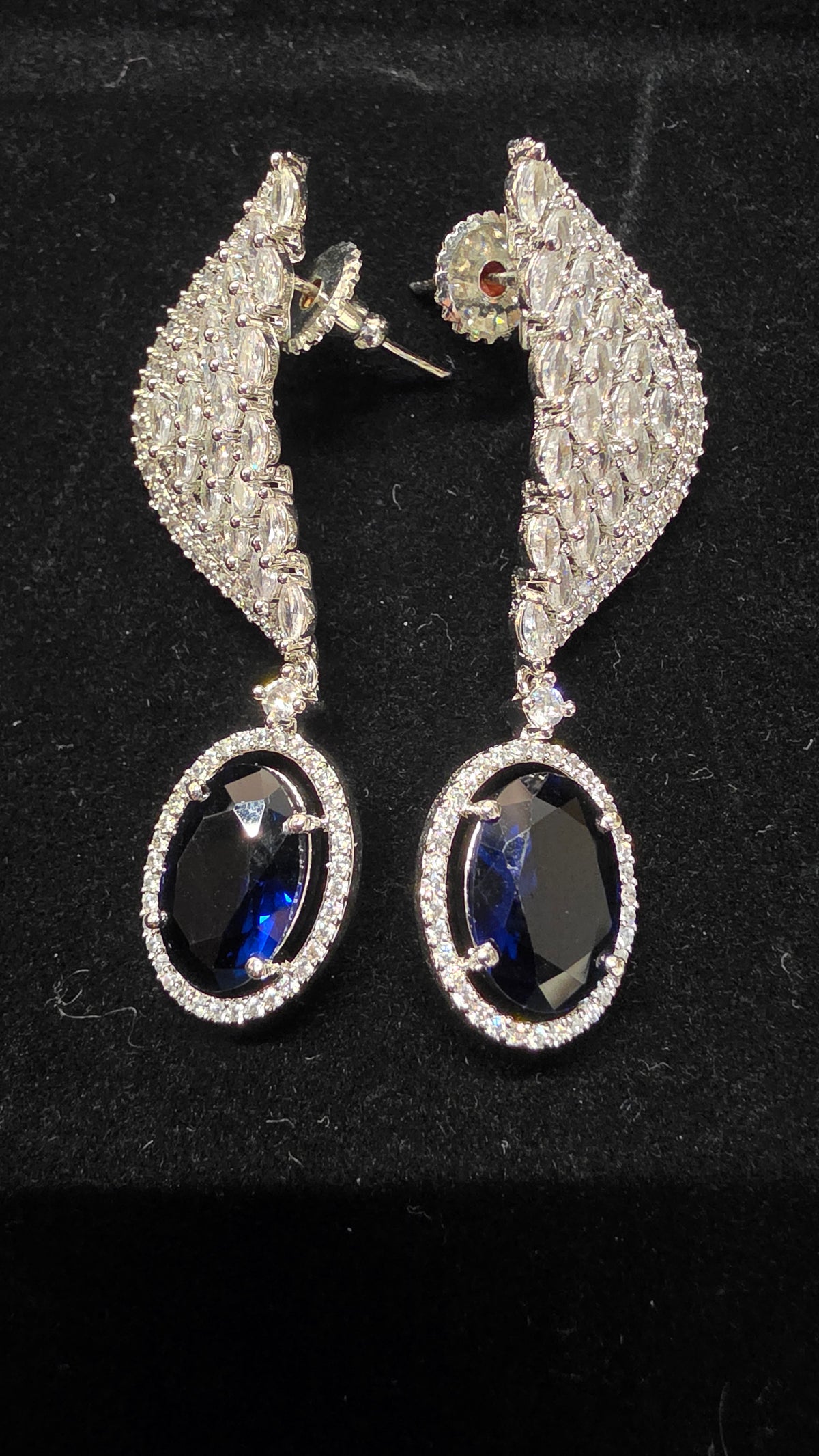 Silver toned diamond Earring with blue oval