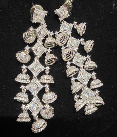 Silver toned long earring with small jumka