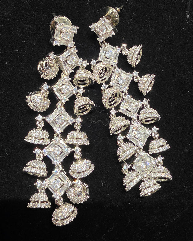 Silver toned long earring with small jumka