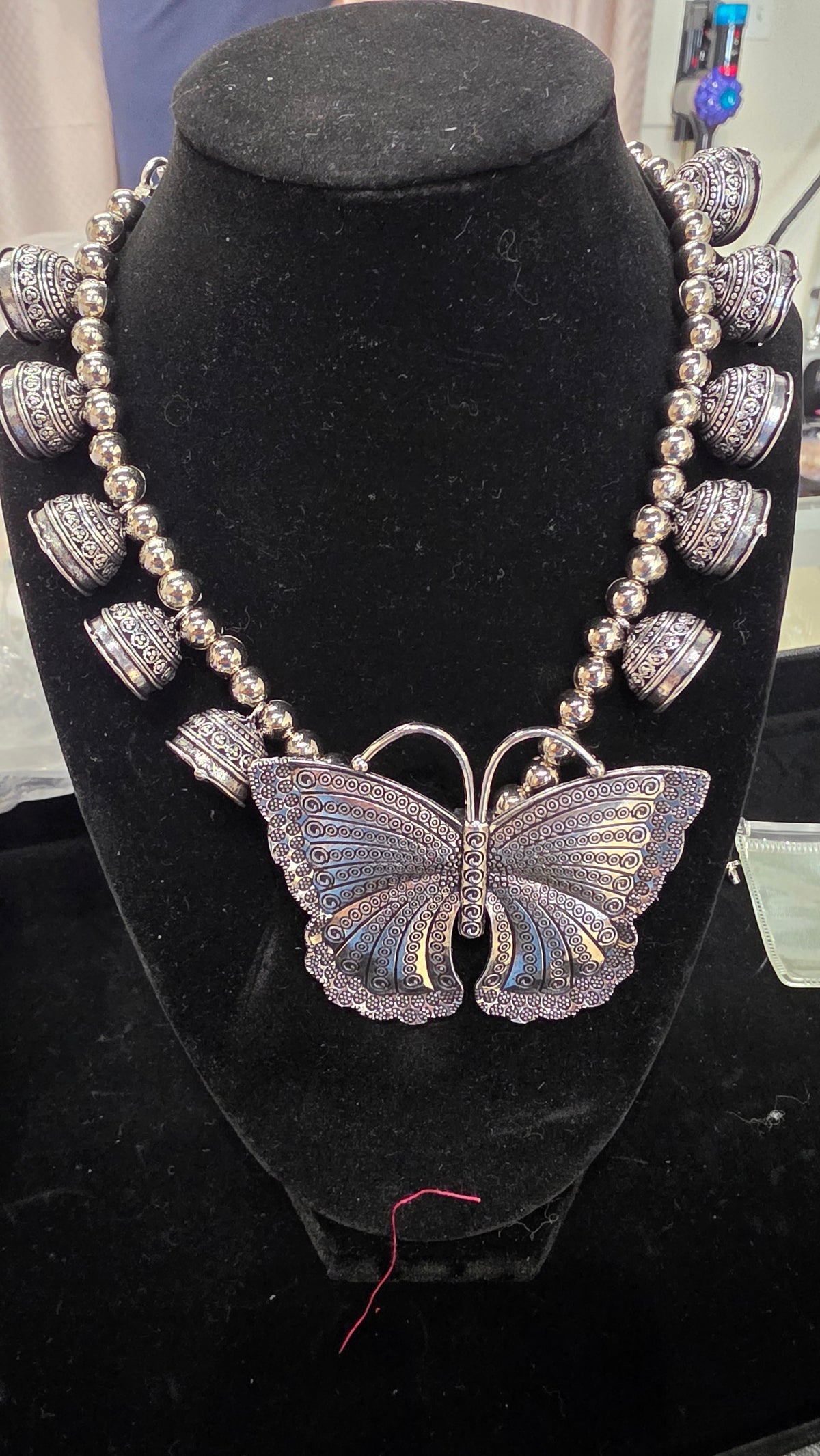 Oxodised  butterfly necklace with small jumka charms
